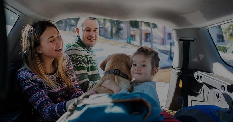 family in car